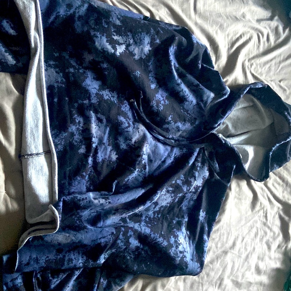 Blue and black Open Edit cropped hoodie.